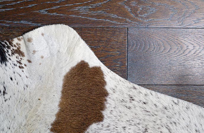 cowhide leather and faux fur hide rug brown engineered hardwood floor