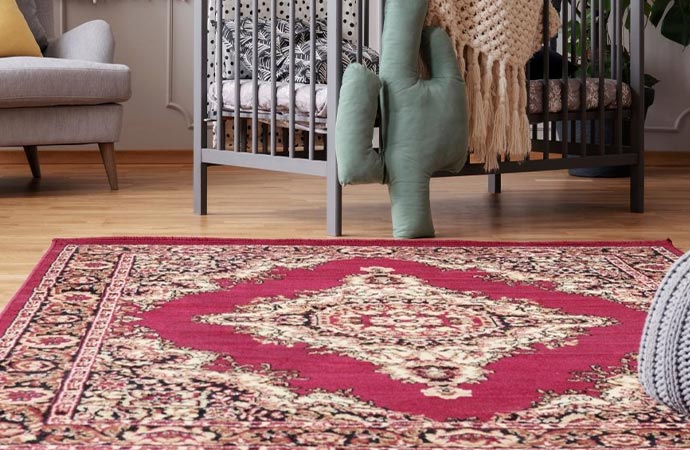 A rug on a wooden floor.